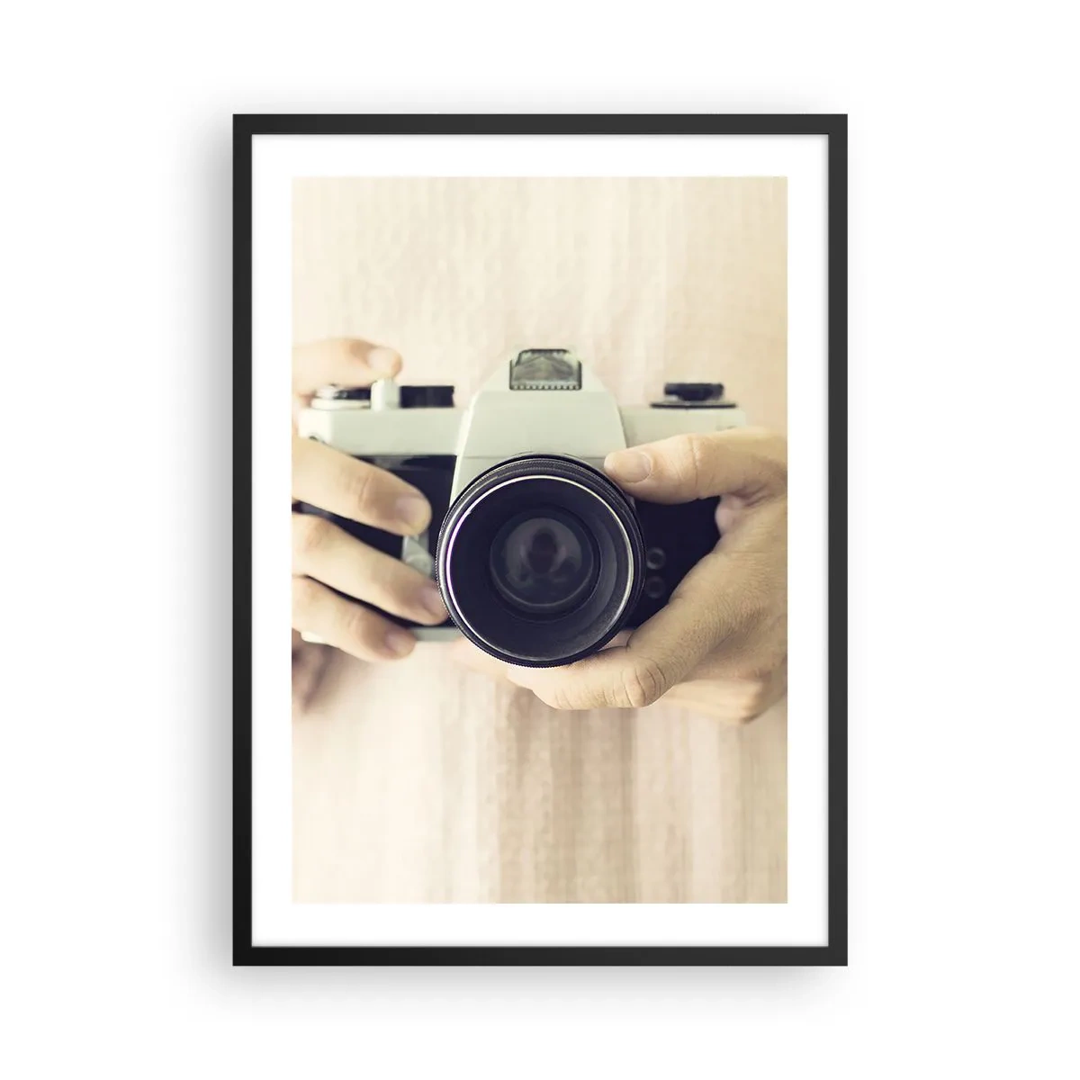 Poster in black frame - Hands holding a classic camera - 50x70cm - To Know More… - Modern wall decoration for the living room and bedroom ARTTOR