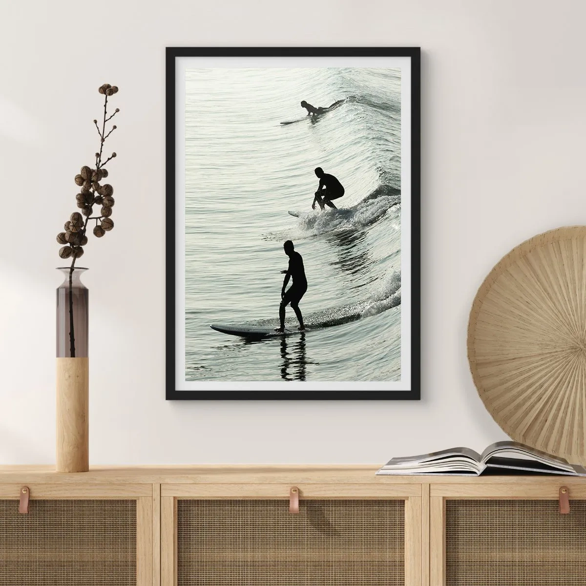 Poster in black frame - Three surfers riding the waves in a monochromatic style - 50x70cm - Meeting the Wave - Modern wall decoration for the living room and bedroom ARTTOR