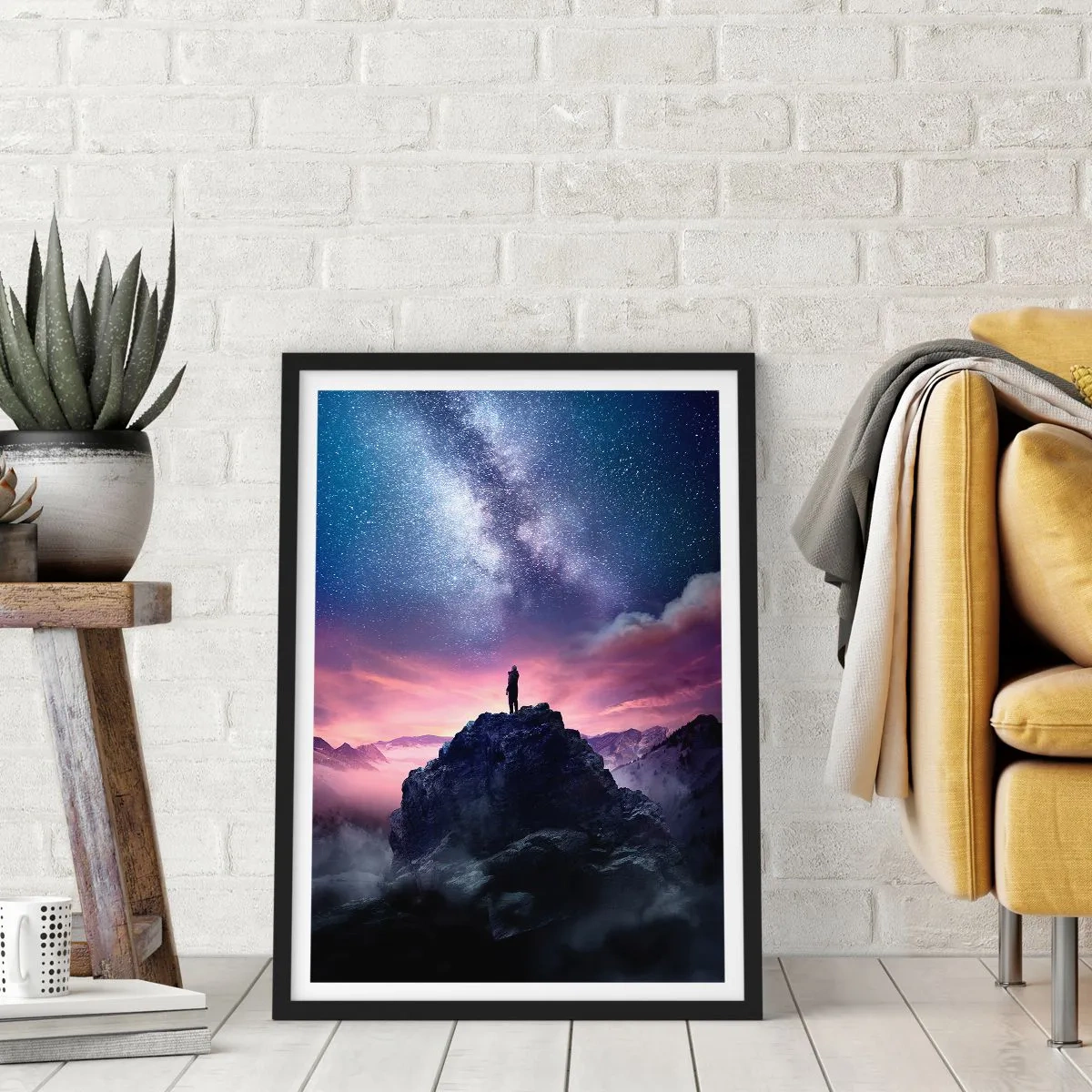 Poster in black frame - Silhouette of a person on a mountaintop under a starry sky - 50x70cm - And He Smelled Life - Modern wall decoration for the living room and bedroom ARTTOR