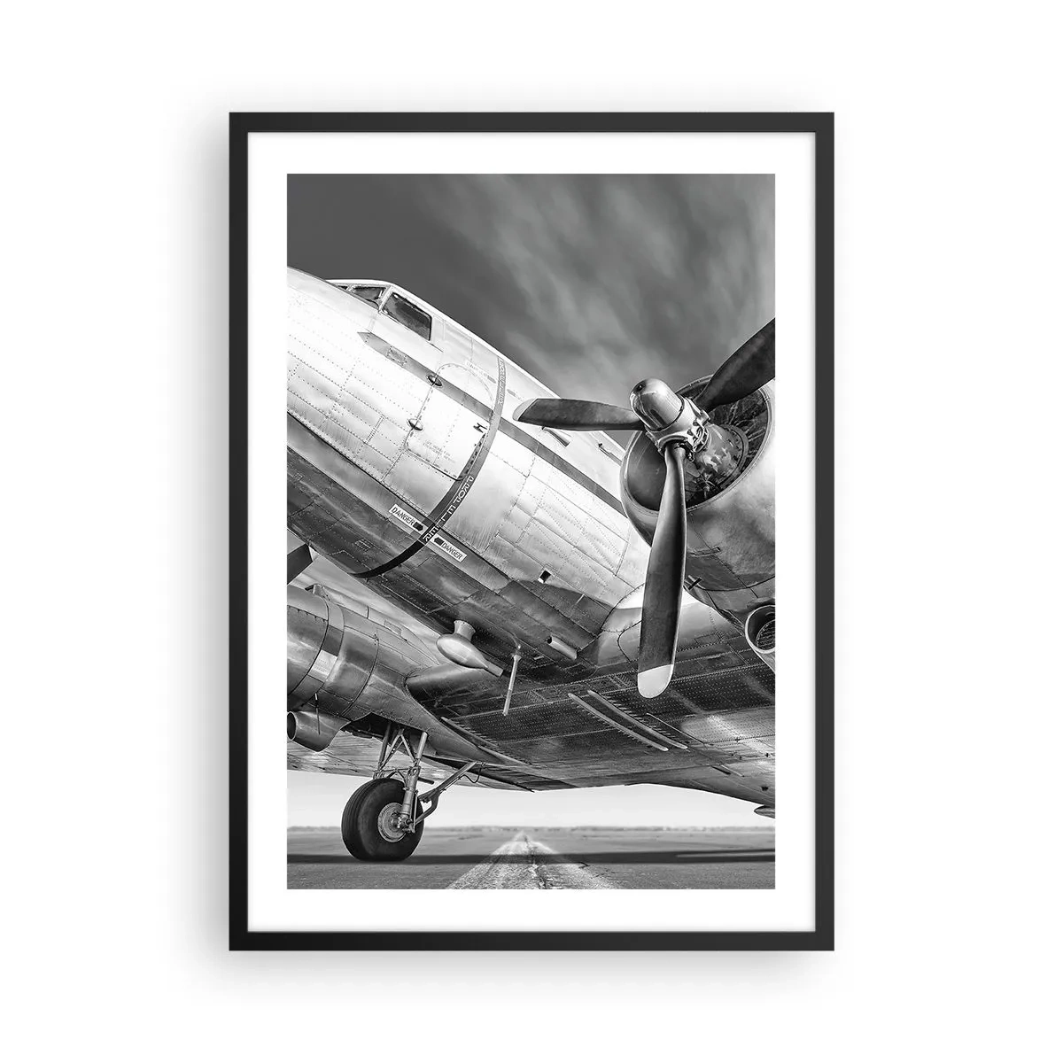 Poster in black frame - A close-up black and white shot of a classic airplane. - 50x70cm - Always Ready to Fly - Modern wall decoration for the living room and bedroom ARTTOR