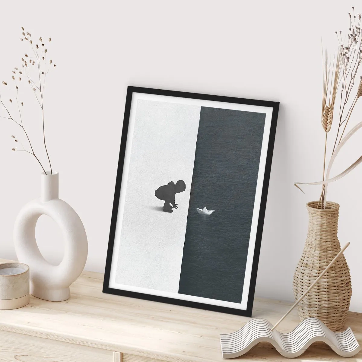 Poster in black frame - A child leaning over the water with a paper boat - 50x70cm - Big Voyage - Modern wall decoration for the living room and bedroom ARTTOR