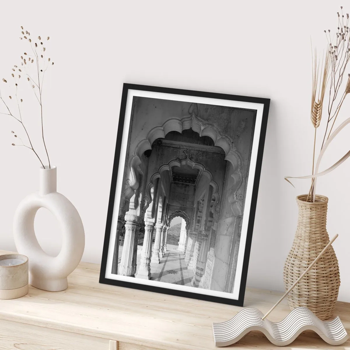 Poster in black frame - Black and white photograph of architecture with columns - 50x70cm - This is a Place of Fairytales of the East - Modern wall decoration for the living room and bedroom ARTTOR