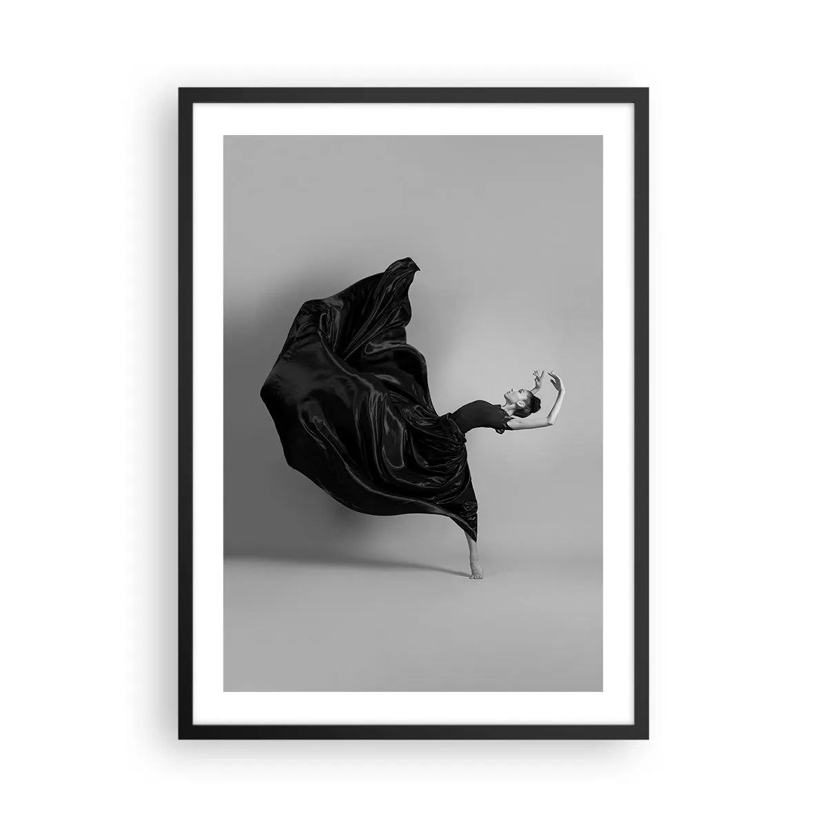 Poster in black frame - An elegant dancer in a black dress in motion - 50x70cm - On the Wings of Music - Modern wall decoration for the living room and bedroom ARTTOR