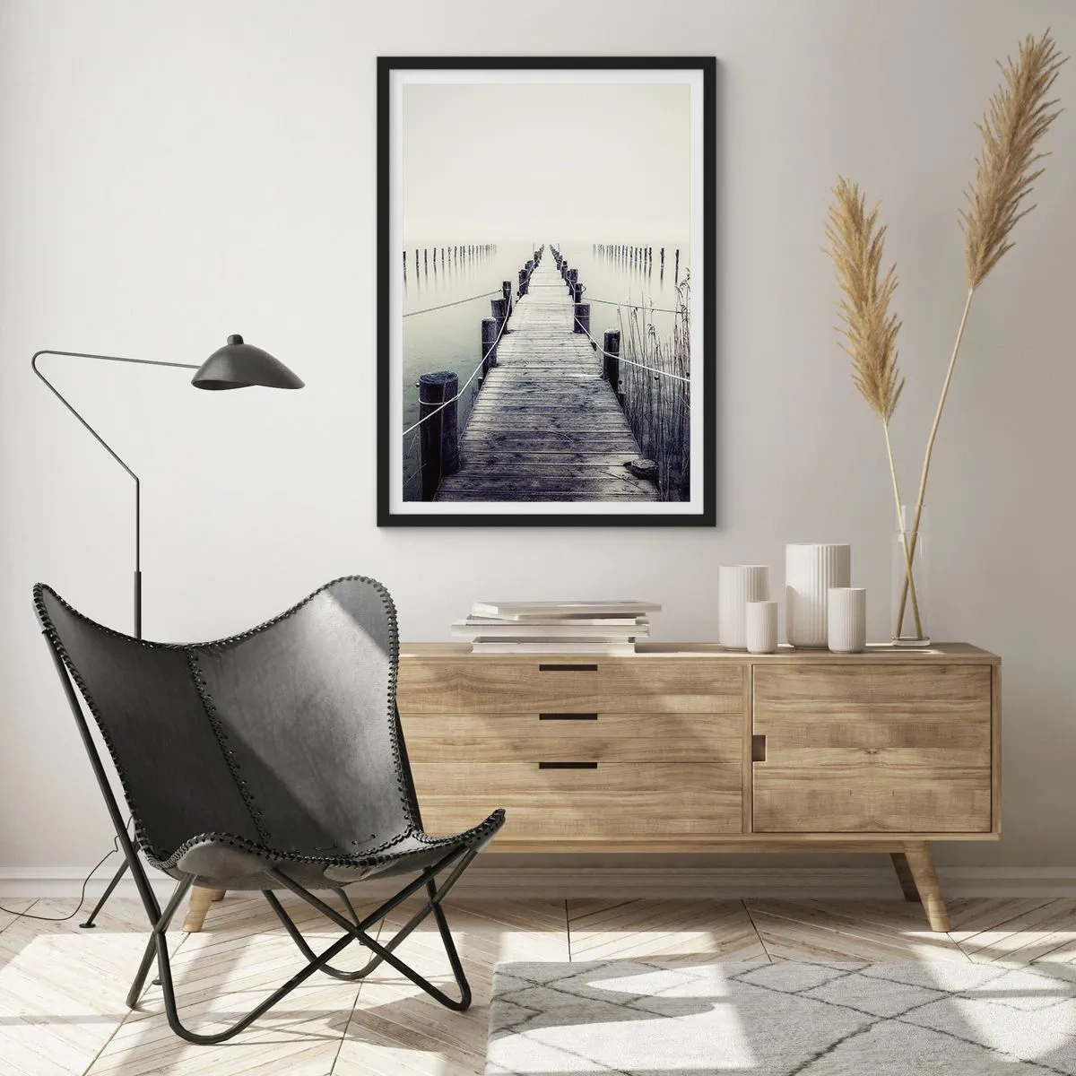 Poster in black frame - A wooden bridge leading into a misty expanse of water - 50x70cm - Immerse Yourself in Peace - Modern wall decoration for the living room and bedroom ARTTOR