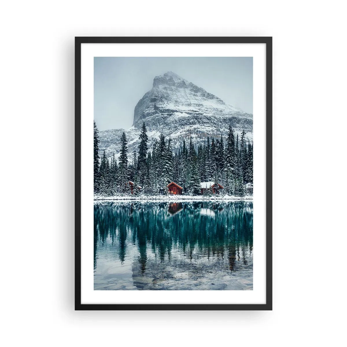 Poster in black frame - Winter landscape with cottages by the lake and a mountain in the background - 50x70cm - Canadian Retreat - Modern wall decoration for the living room and bedroom ARTTOR