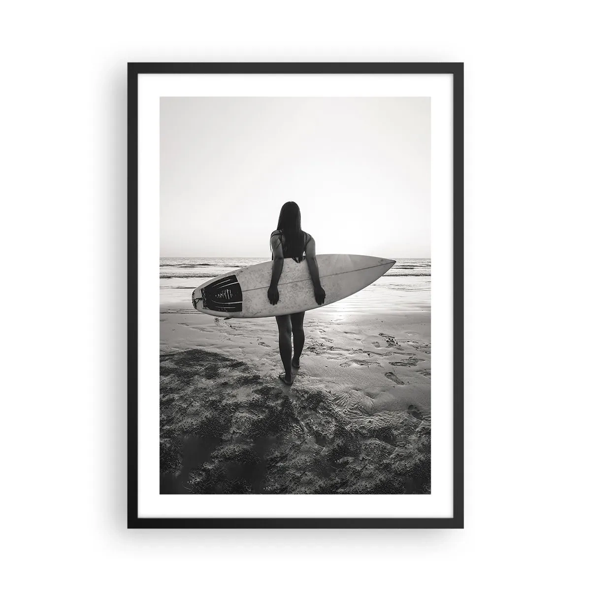 Poster in black frame - Woman with a surfboard on the beach at sunset - 50x70cm - Daughter of Sea Wave - Modern wall decoration for the living room and bedroom ARTTOR