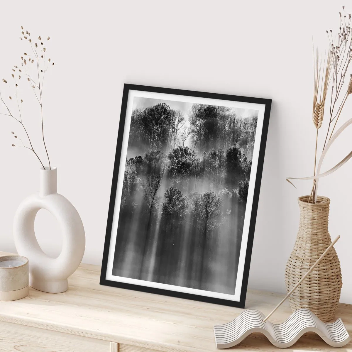 Poster in black frame - Black and white forest in the fog with sun rays - 50x70cm - In the Streams of Light - Modern wall decoration for the living room and bedroom ARTTOR