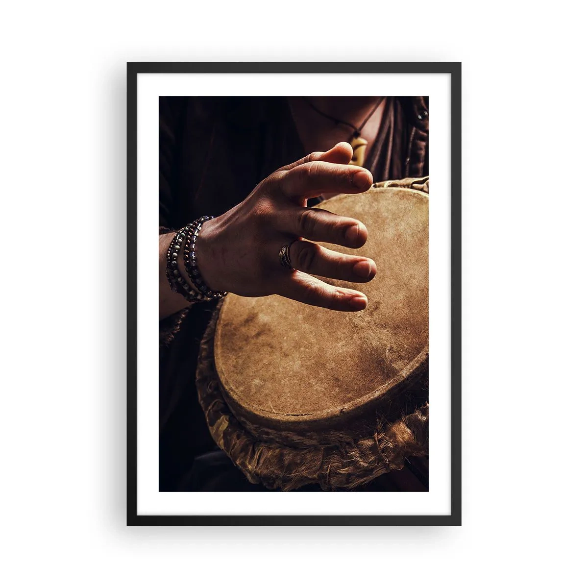 Poster in black frame - A hand playing a drum in warm light - 50x70cm - In the Rhythm of the Heart - Modern wall decoration for the living room and bedroom ARTTOR