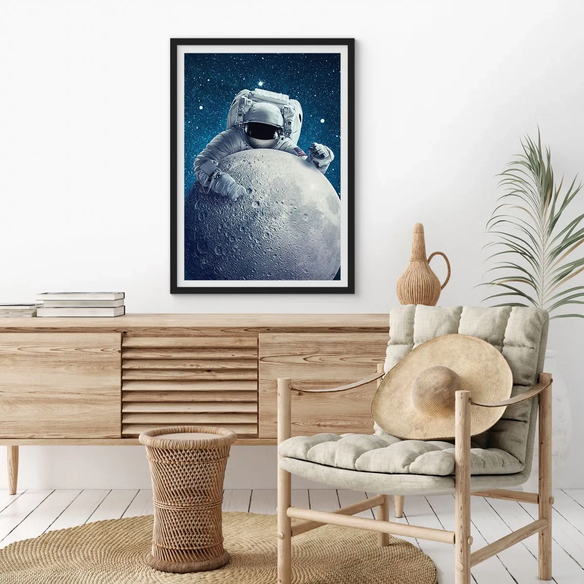 Poster in black frame - An astronaut holding a piece of the moon against a starry sky. - 50x70cm - Space Joker - Modern wall decoration for the living room and bedroom ARTTOR