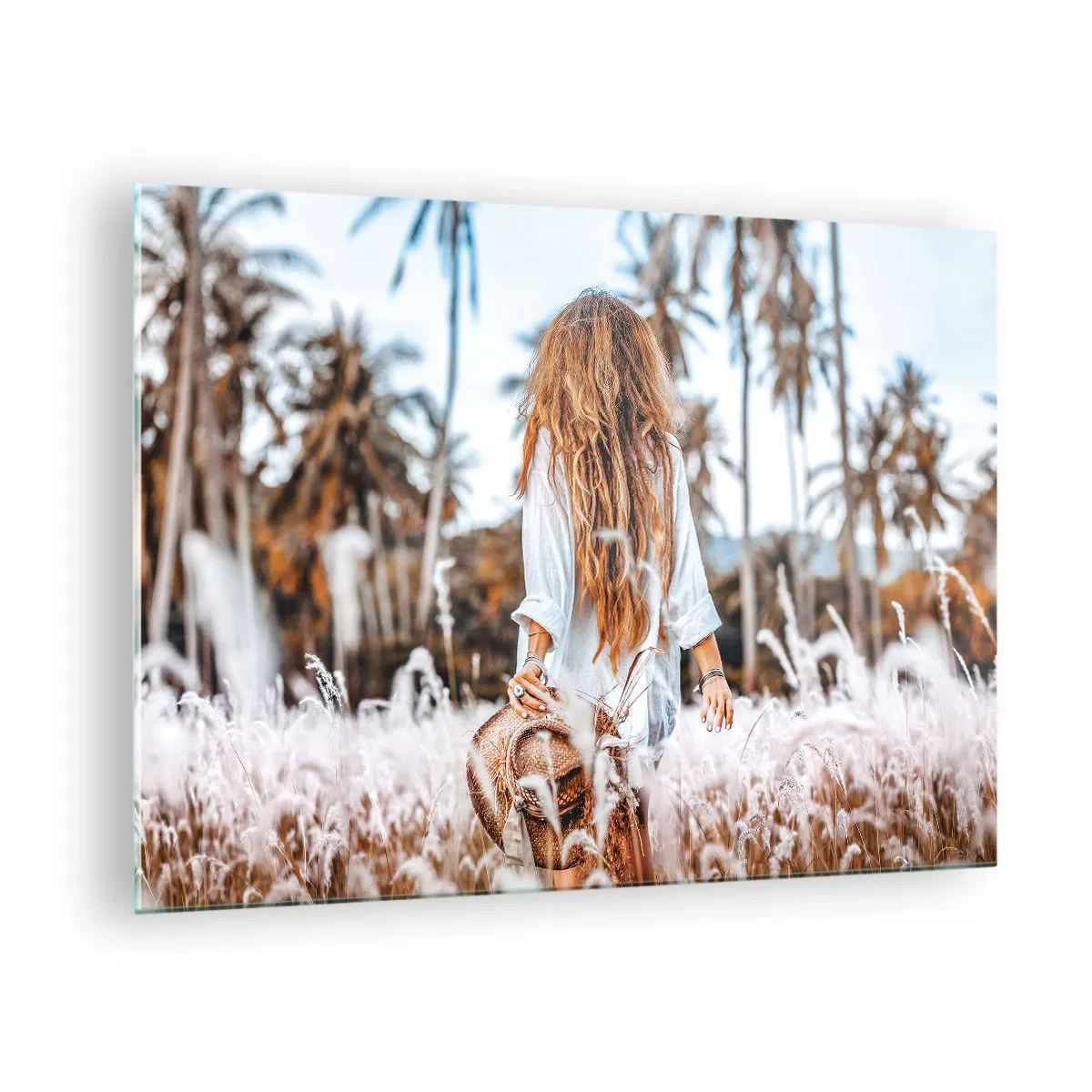 Glass picture - A woman in the grass with a hat in her hand against a background of palm trees - 70x50cm - Born from Grass Fluff - Modern wall decoration for the living room and bedroom ARTTOR