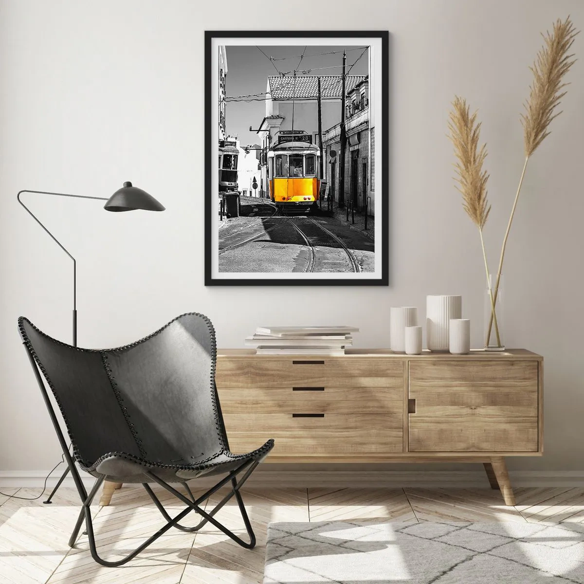 Poster in black frame - A yellow tram on the city streets in a black and white setting - 50x70cm - Spirit of Lisbon - Modern wall decoration for the living room and bedroom ARTTOR